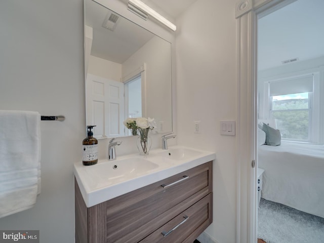 27 Seaton Pl NW, Washington, DC 20001 - bathroom with double vanity, a sink, and visible vents