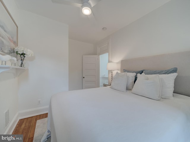 27 Seaton Pl NW, Washington, DC 20001 - bedroom with visible vents, baseboards, ceiling fan, and wood finished floors