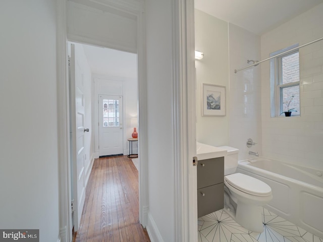 27 Seaton Pl NW, Washington, DC 20001 - full bath featuring vanity, tub / shower combination, hardwood / wood-style floors, and toilet