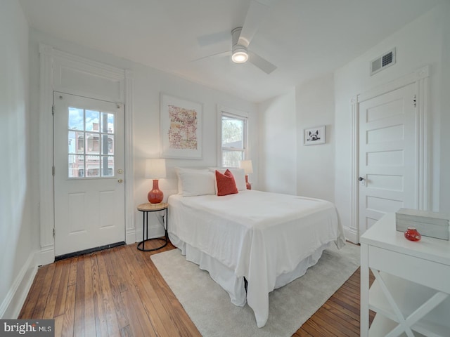 27 Seaton Pl NW, Washington, DC 20001 - bedroom with wood-type flooring, a ceiling fan, and visible vents