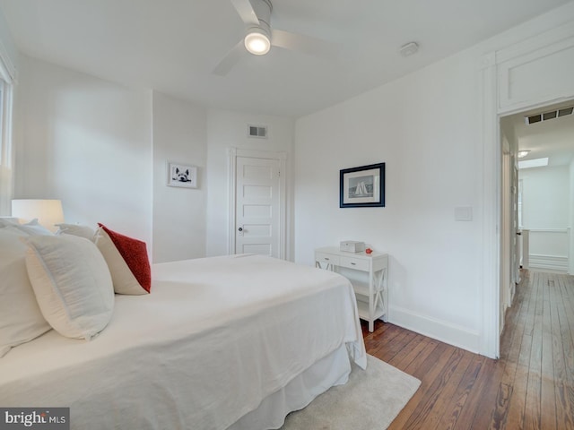 27 Seaton Pl NW, Washington, DC 20001 - bedroom featuring visible vents, a ceiling fan, baseboards, and hardwood / wood-style floors