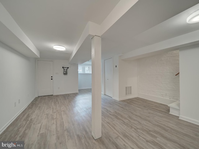 27 Seaton Pl NW, Washington, DC 20001 - basement featuring baseboards, wood finished floors, and visible vents