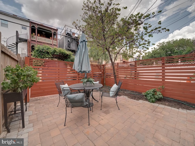 27 Seaton Pl NW, Washington, DC 20001 - view of patio / terrace featuring a fenced backyard and outdoor dining area
