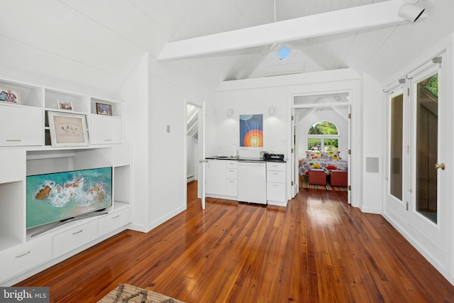 living room with lofted ceiling with beams and dark wood-style floors