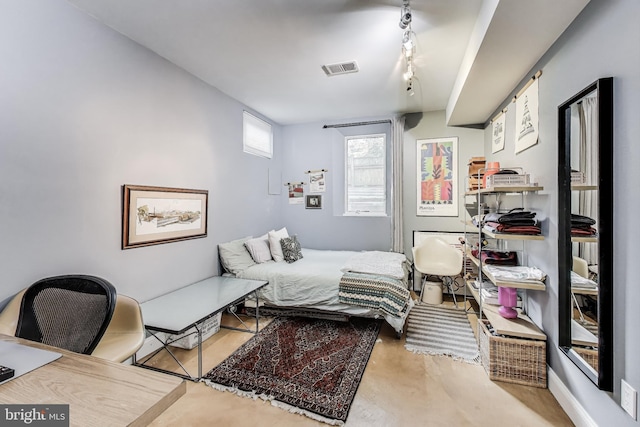 bedroom featuring visible vents