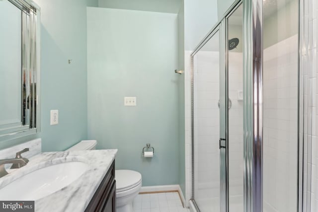 12815 Duck Pond Dr Unit 111, Germantown, MD 20874 - full bath with vanity, toilet, baseboards, and a stall shower