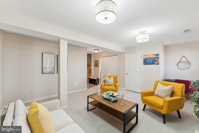 12815 Duck Pond Dr Unit 111, Germantown, MD 20874 - living room with visible vents, baseboards, and light colored carpet