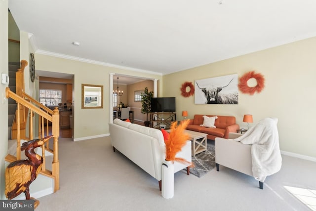 12815 Duck Pond Dr Unit 111, Germantown, MD 20874 - living room with an inviting chandelier, baseboards, a healthy amount of sunlight, and light colored carpet