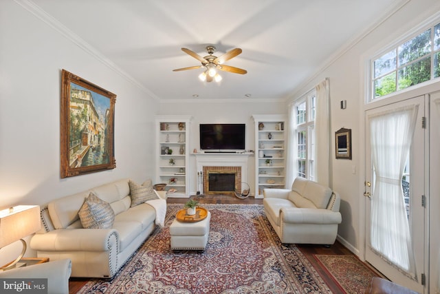 11406 Royal Vw, North Potomac, MD 20878 - living room with ceiling fan, wood finished floors, ornamental molding, a brick fireplace, and built in features