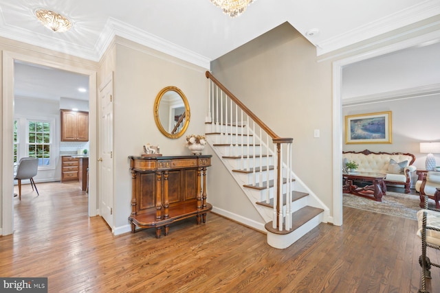 11406 Royal Vw, North Potomac, MD 20878 - staircase with wood finished floors, crown molding, baseboards, and a chandelier