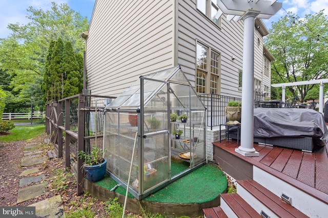11406 Royal Vw, North Potomac, MD 20878 - view of side of home featuring fence, a deck, and an exterior structure