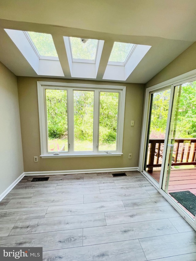 6062 Clay Spur Ct, Centreville, VA 20121 - unfurnished sunroom featuring a skylight and lofted ceiling