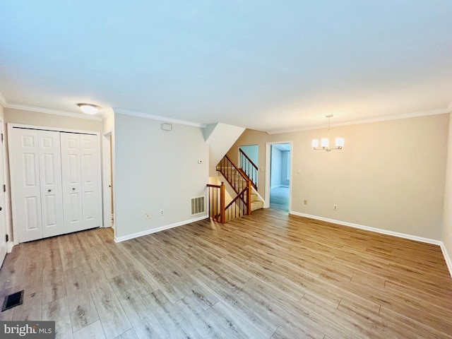 6062 Clay Spur Ct, Centreville, VA 20121 - unfurnished living room with a chandelier, crown molding, light wood finished floors, baseboards, and stairway