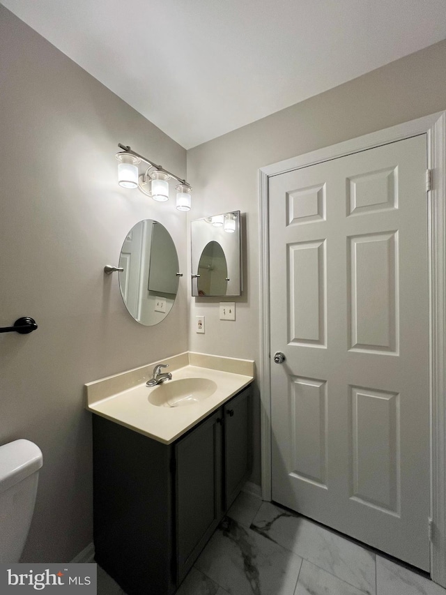 6062 Clay Spur Ct, Centreville, VA 20121 - half bath featuring marble finish flooring, vanity, and toilet