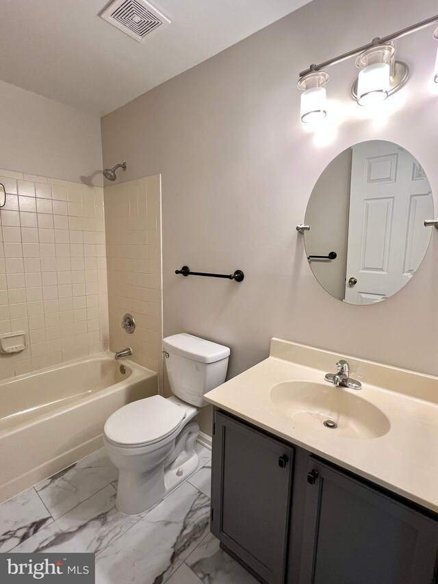 6062 Clay Spur Ct, Centreville, VA 20121 - full bath with toilet, vanity, shower / washtub combination, and marble finish flooring