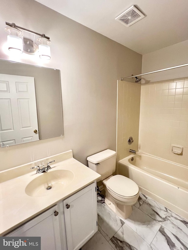6062 Clay Spur Ct, Centreville, VA 20121 - bathroom with marble look tile flooring, toilet, vanity, and  shower combination