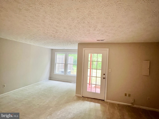 6062 Clay Spur Ct, Centreville, VA 20121 - entryway with baseboards, carpet, and a textured ceiling