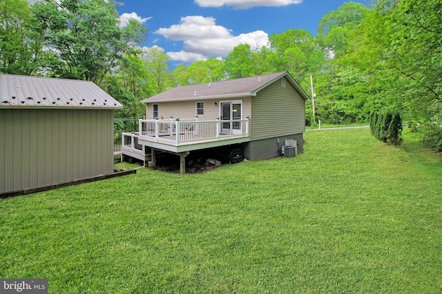 19 Old Hilltop Rd, Conowingo, MD 21918 - back of house with a yard, a wooden deck, and central air condition unit