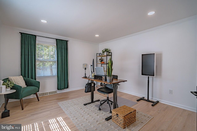 office with crown molding, light wood-style floors, baseboards, and visible vents