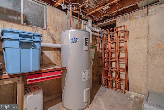 utility room with electric water heater