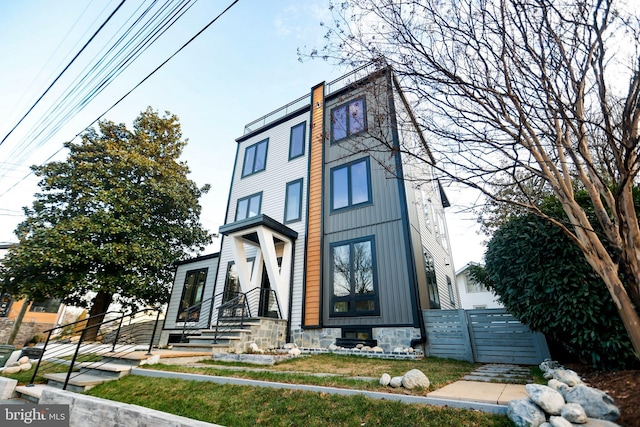 view of front of home with fence