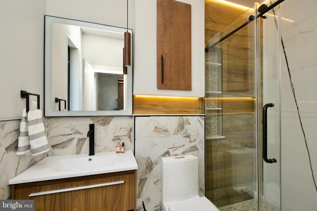 full bath featuring decorative backsplash, tile walls, a stall shower, vanity, and toilet