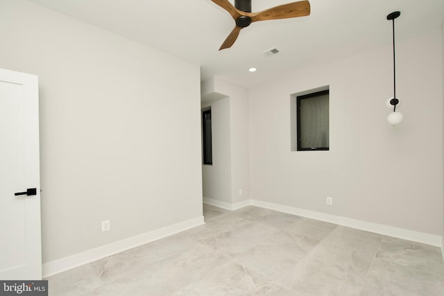 unfurnished room with recessed lighting, ceiling fan, visible vents, and baseboards