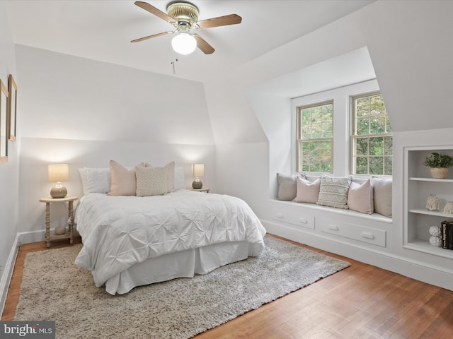 bedroom featuring wood finished floors and ceiling fan