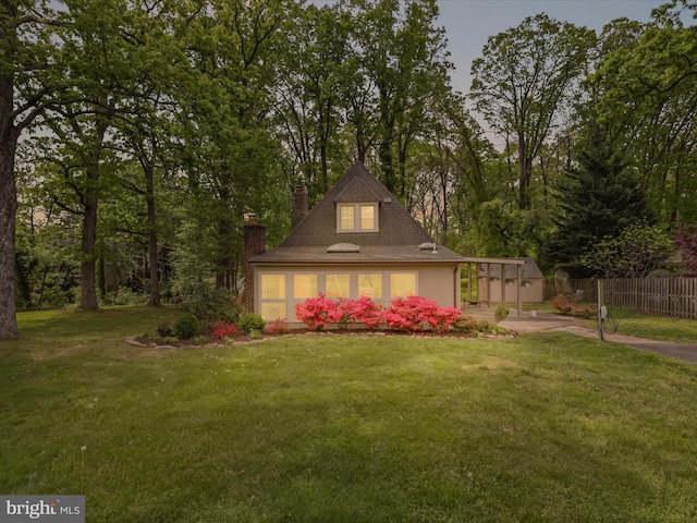 view of front of property featuring a chimney