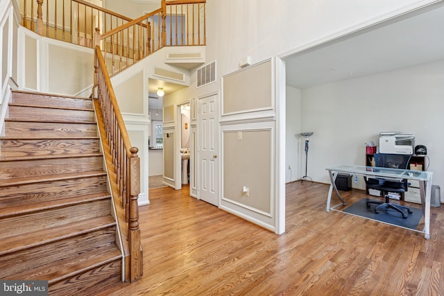 3401 Kidder Rd, Clinton, MD 20735 - stairway with wood finished floors and a high ceiling