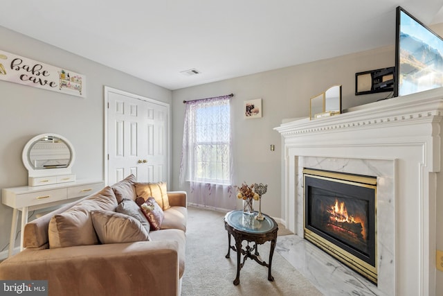 3401 Kidder Rd, Clinton, MD 20735 - living area with a high end fireplace, light marble finish flooring, and baseboards