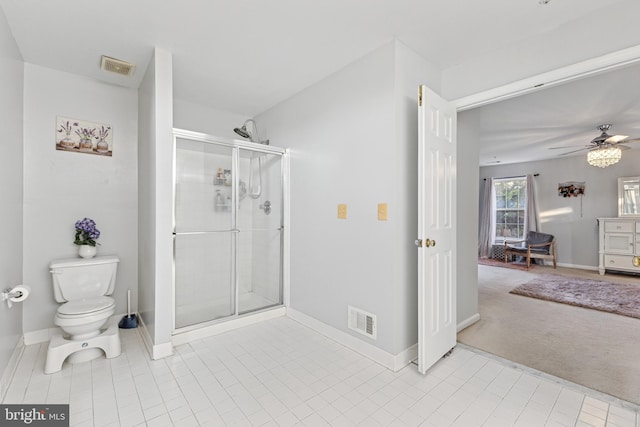 3401 Kidder Rd, Clinton, MD 20735 - bathroom with a stall shower, baseboards, toilet, and a ceiling fan