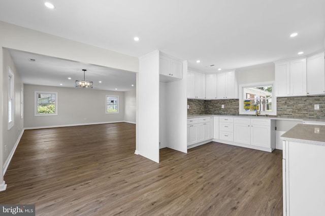 kitchen with plenty of natural light, recessed lighting, and tasteful backsplash