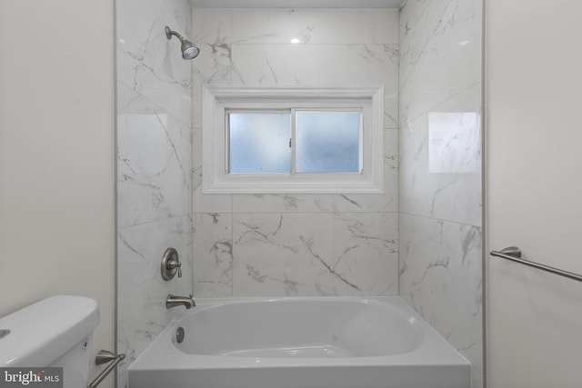 full bathroom featuring bathtub / shower combination and toilet