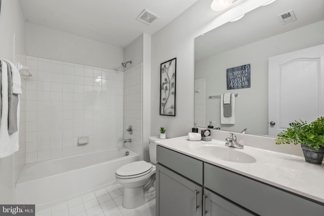 full bath featuring shower / bathing tub combination, visible vents, tile patterned floors, vanity, and toilet