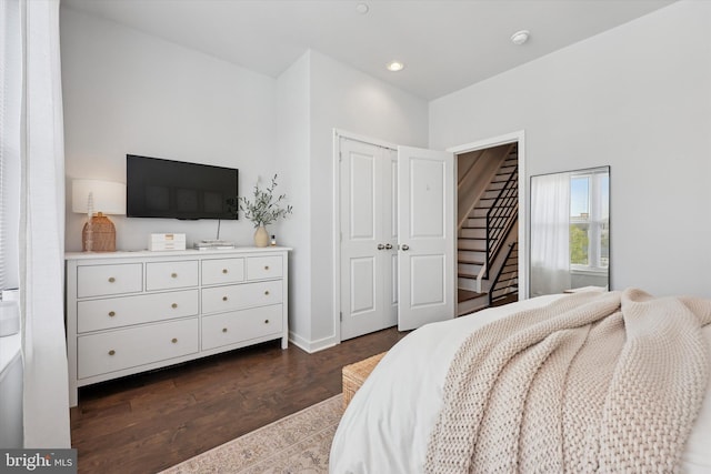 bedroom featuring recessed lighting, baseboards, and dark wood-style floors
