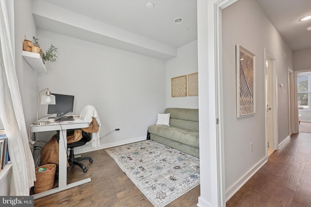 office area featuring baseboards, recessed lighting, and wood finished floors