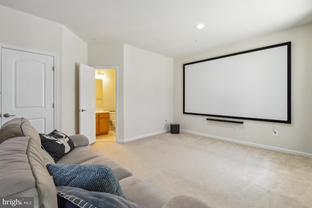 cinema room with recessed lighting, baseboards, and light colored carpet
