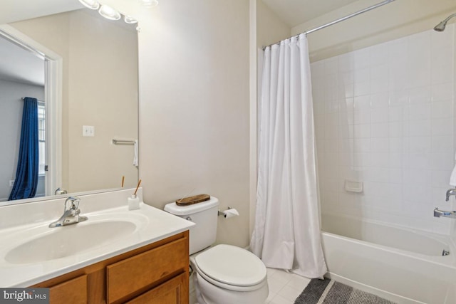 bathroom with vanity, tile patterned flooring, shower / bath combo, and toilet