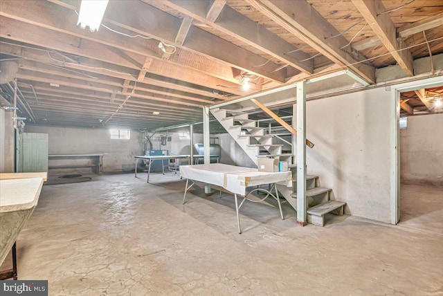 basement featuring stairway