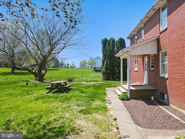 view of yard with fence