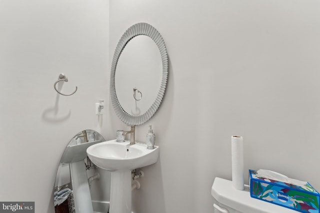 half bathroom with toilet
