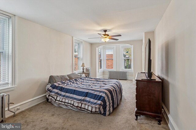 2518 N 12th St, Philadelphia, PA 19133 - carpeted bedroom with a ceiling fan, baseboards, and radiator heating unit