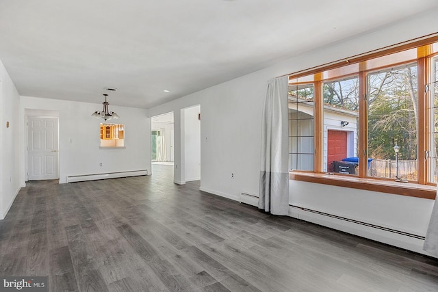 24 Elk Rd, Mullica Hill, NJ 08062 - unfurnished living room with baseboards, a baseboard heating unit, baseboard heating, and dark wood-style floors