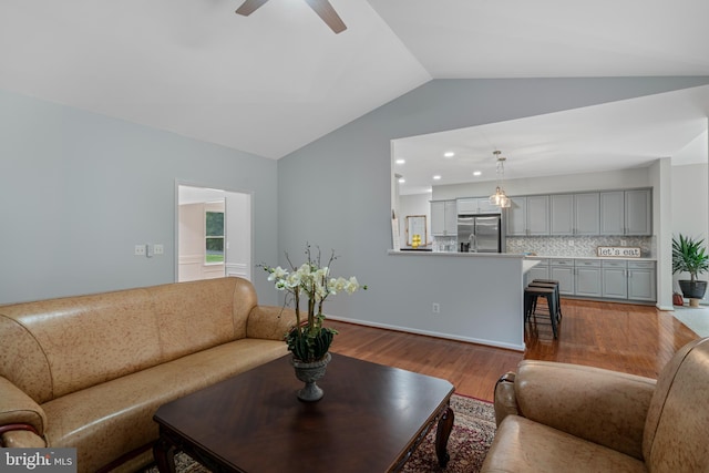 13647 Van Doren Rd, Manassas, VA 20112 - living room featuring lofted ceiling, wood finished floors, a ceiling fan, and recessed lighting