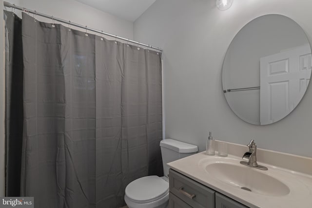 13647 Van Doren Rd, Manassas, VA 20112 - full bathroom with toilet, vanity, and a shower with shower curtain