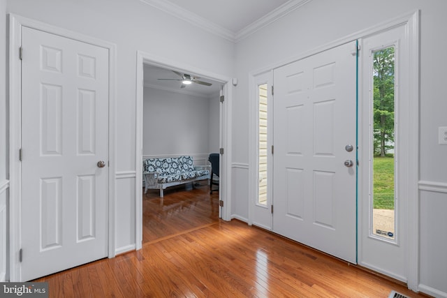 13647 Van Doren Rd, Manassas, VA 20112 - entryway with ornamental molding, wood-type flooring, and a ceiling fan