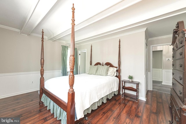 bedroom with crown molding, baseboards, beam ceiling, and wood finished floors