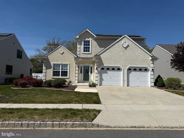 traditional-style home with an attached garage, stucco siding, driveway, and a front yard