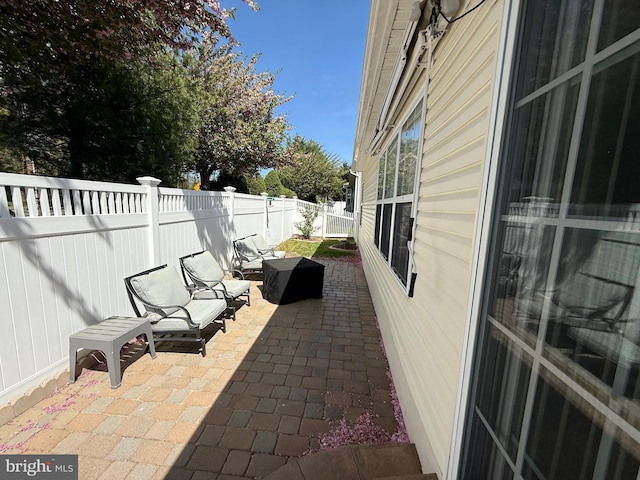 view of patio with a fenced backyard